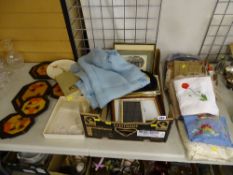 Box of portrait frames, miscellaneous tableware and linen