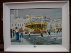 IEUAN WILLIAMS oil on board - children playing at the fairground, 28 x 40 cms