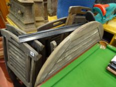 Wooden circular garden table, folding chairs and Bosch cordless hedgetrimmer