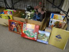 Two boxes of board games and jigsaws and a box of Staffs planters etc