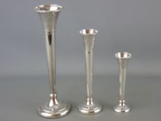 Trio of graduated bud vases