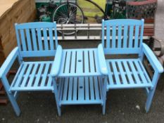 Blue painted garden duet seat with central table