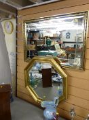 Octagonal bevelled gilt framed wall mirror and another oblong