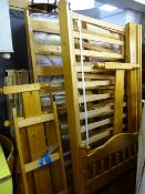 Pine framed junior double bed and a set of pine framed bunk beds