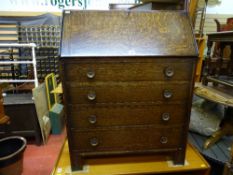 Oak four drawer writing bureau, polished wood drop leaf drinks trolley and nest of two tables