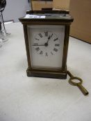 Enamel faced brass carriage clock