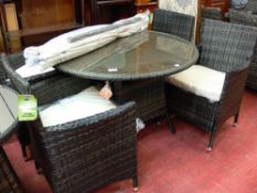 Excellent rattan garden/conservatory set comprising circular table, four chairs and a parasol