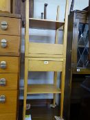 Pair of light wood single drawer bedside tables with under shelves