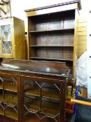 Polished wood twin door and glazed multi-shelf display cabinet and a five shelf mahogany bookshelf