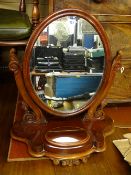 Victorian mahogany oval vanity mirror with lift-up lid compartment