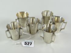 A set of six silver tri-handled schnapps cups, London 1907, 5ozs Condition reports provided on