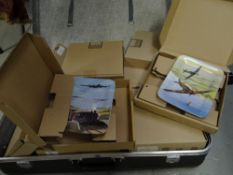 A collection of boxed aviation collectors plates together with stands contained in a vintage