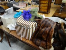 A parcel of furs and bonnets in three hat boxes Condition reports provided on request by email for