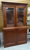 A vintage mahogany bookcase cupboard, 121cms wide Condition reports provided on request by email for