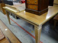 A modern lightwood extending dining table, 107 x 162cms Condition reports provided on request by