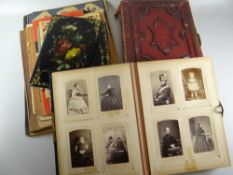 Two ornately bound Victorian family photograph albums, a scrapbook of 1930s singers and musicians