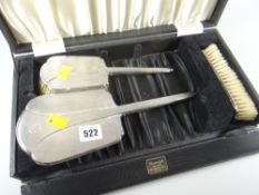 Cased silver three-piece ladies vanity set, Birmingham hallmark, maker Wilson & Gill Condition