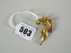 18ct gold ruby bow and foliate bar brooch, 7.9grams Condition reports provided on request by email