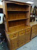 A modern pine dresser, 115cms wide Condition reports provided on request by email for this auction