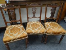 Three vintage carved chairs with cushioned seats Condition reports provided on request by email