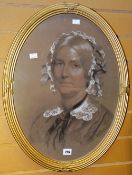 A nineteenth century gilt frame oval portrait and crayon head & shoulders portrait of Mrs S H