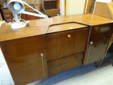 A mid-century Beautility cocktail cabinet sideboard, 140cms wide Condition reports provided on