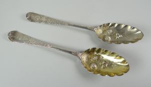 Two silver engraved berry spoons, late eighteenth / early nineteenth century, rubbed hallmarks