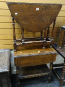 Small oak drop leaf table together with a later drop side trolley Condition reports provided on