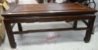 A twentieth century Chinese hardwood Long John coffee table, 102cms long x 45cms high Condition