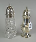 A silver caster of baluster form and another in glass with silver top Condition reports provided
