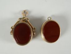 9ct gold revolving fob and bloodstone locket (2) Condition reports provided on request by email