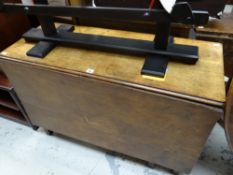 A nineteenth century oak drop flap table with single end drawer, 106cms wide Condition reports