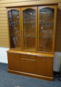 A modern bookcase cupboard with etched glazed top, 131cms wide Condition reports provided on request