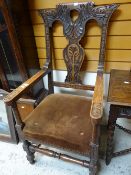 A good antique carved cushion seat elbow hall-chair Condition reports provided on request by email