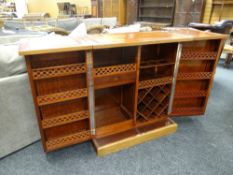 A Far Eastern hardwood and Oriental decorated metamorphic bar / drinks cupboard Condition reports