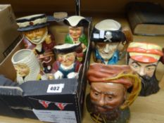 A collection of eight character jugs by various factories including a Royal Doulton W G Grace and