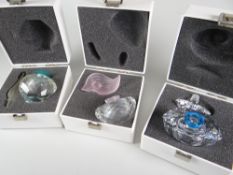 Three boxed Swarovski scent bottles Condition reports provided on request by email for this