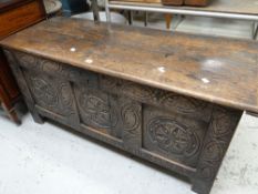 An early nineteenth century carved oak coffer chest, probably Welsh (very distressed internally