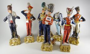 A collection of seven Capodimonte ceramic figures modelled as British military officers of the