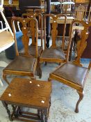 A set of four vintage splat back dining chairs and a nest of three coffee tables Condition reports