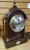 An Edwardian inlaid mahogany dome-top architectural-form bracket clock with gilt metal mounts and