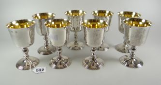 A set of eight Elizabeth II silver goblets with gilt interiors and knopped stems, London 1971, 39ozs
