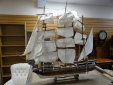 A twentieth century model sailing ship, 87cms wide Condition reports provided on request by email