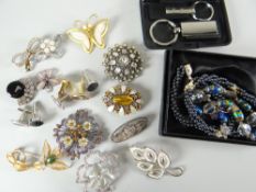 Small parcel of costume jewellery, mainly brooches, gentleman's cuff links ETC Condition reports