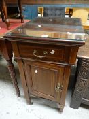 A vintage inlaid mahogany cabinet on castors with cupboard and single drawer Condition reports