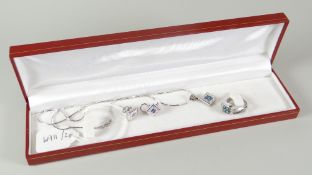 A group of 14k white gold jewellery set with natural and blue treated diamonds, to comprise ring 6.