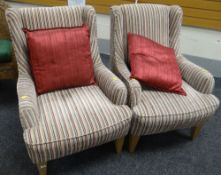 A pair of modern stripe upholstered armchairs Condition reports provided on request by email for