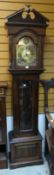 A reproduction oak encased grandfather clock with brass effect dial Condition reports provided on
