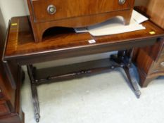 A reproduction mahogany Long John coffee table with drop-ends Condition reports provided on