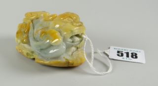 Believed Chinese jade toggle in the form of a lion dog recumbent on naturalistic base Condition